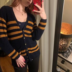 Knitted navy blue sweater.